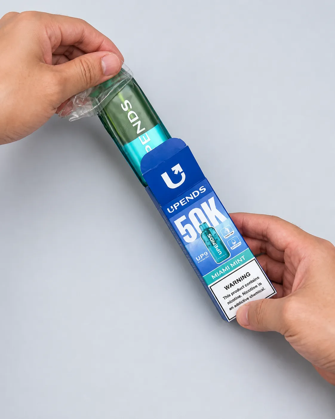 UP9 Ersatzpod wird aus der geöffneten Verkaufsverpackung genommen